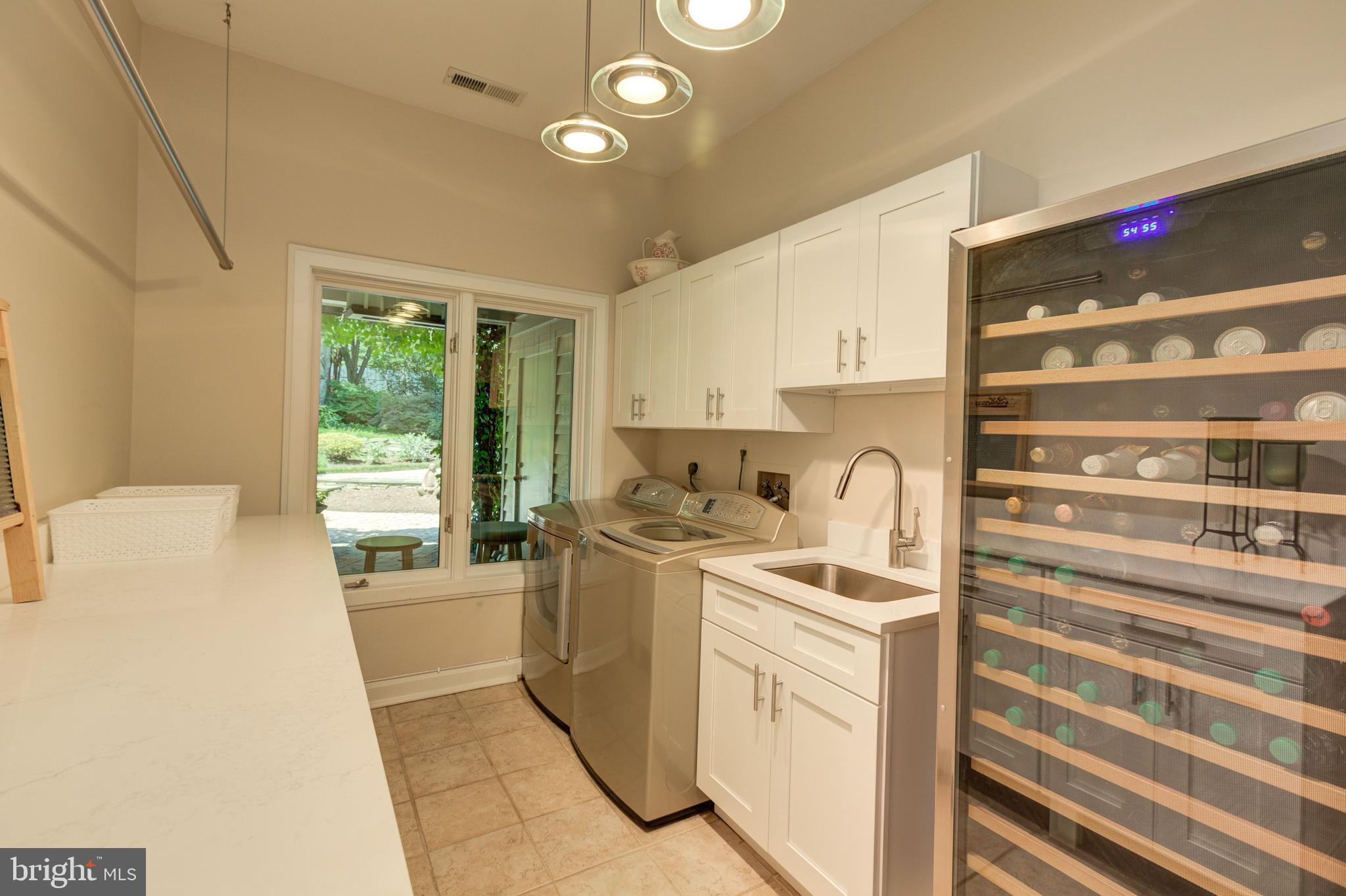 724 Clear Spring Road Great Falls, VA 22066 - Photo 43 of 57 Laundry room/beverage refrigerator(conveys)