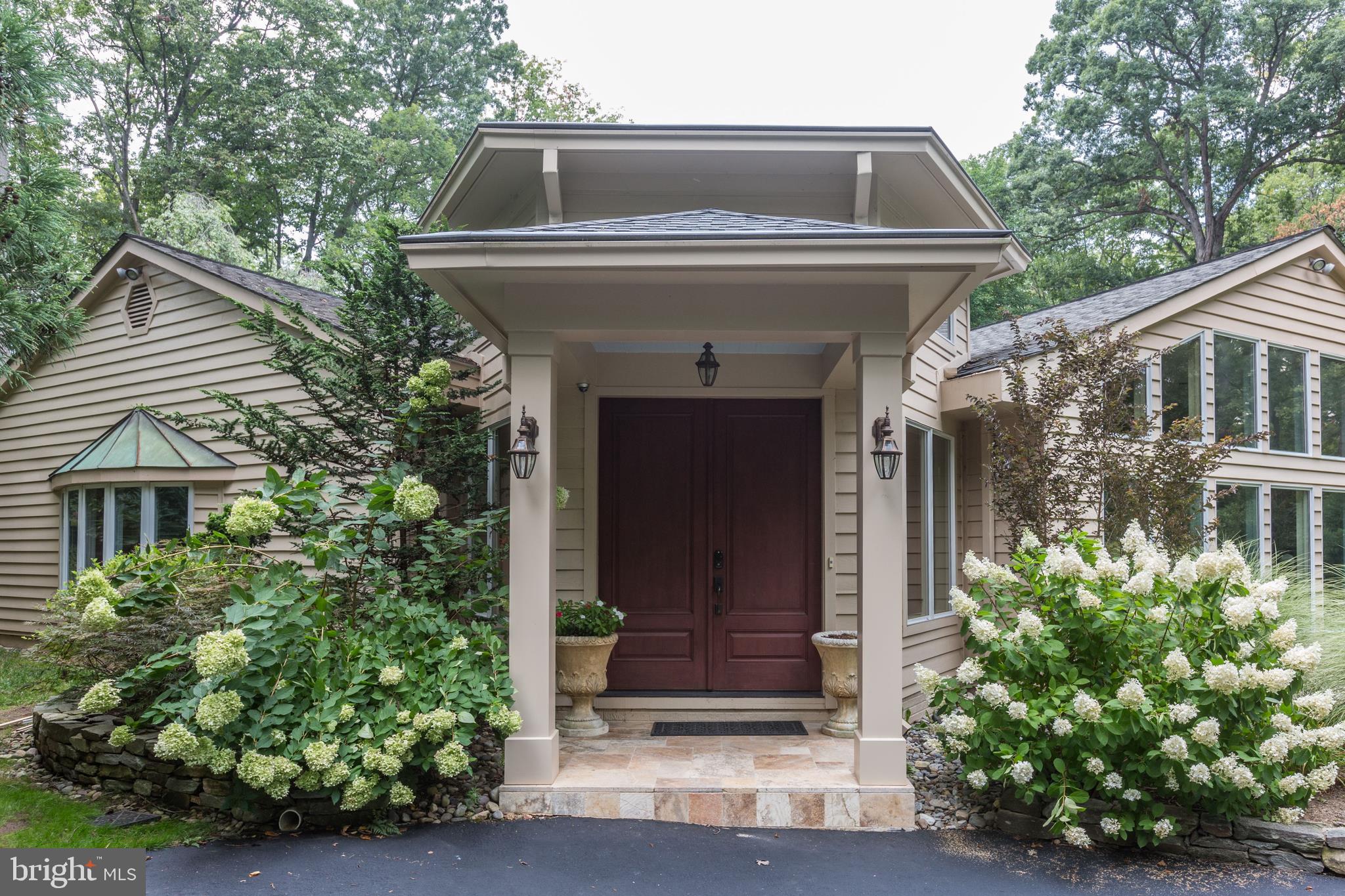 724 Clear Spring Road Great Falls, VA 22066 - Photo 6 of 57 Your portico entrance protects your guests