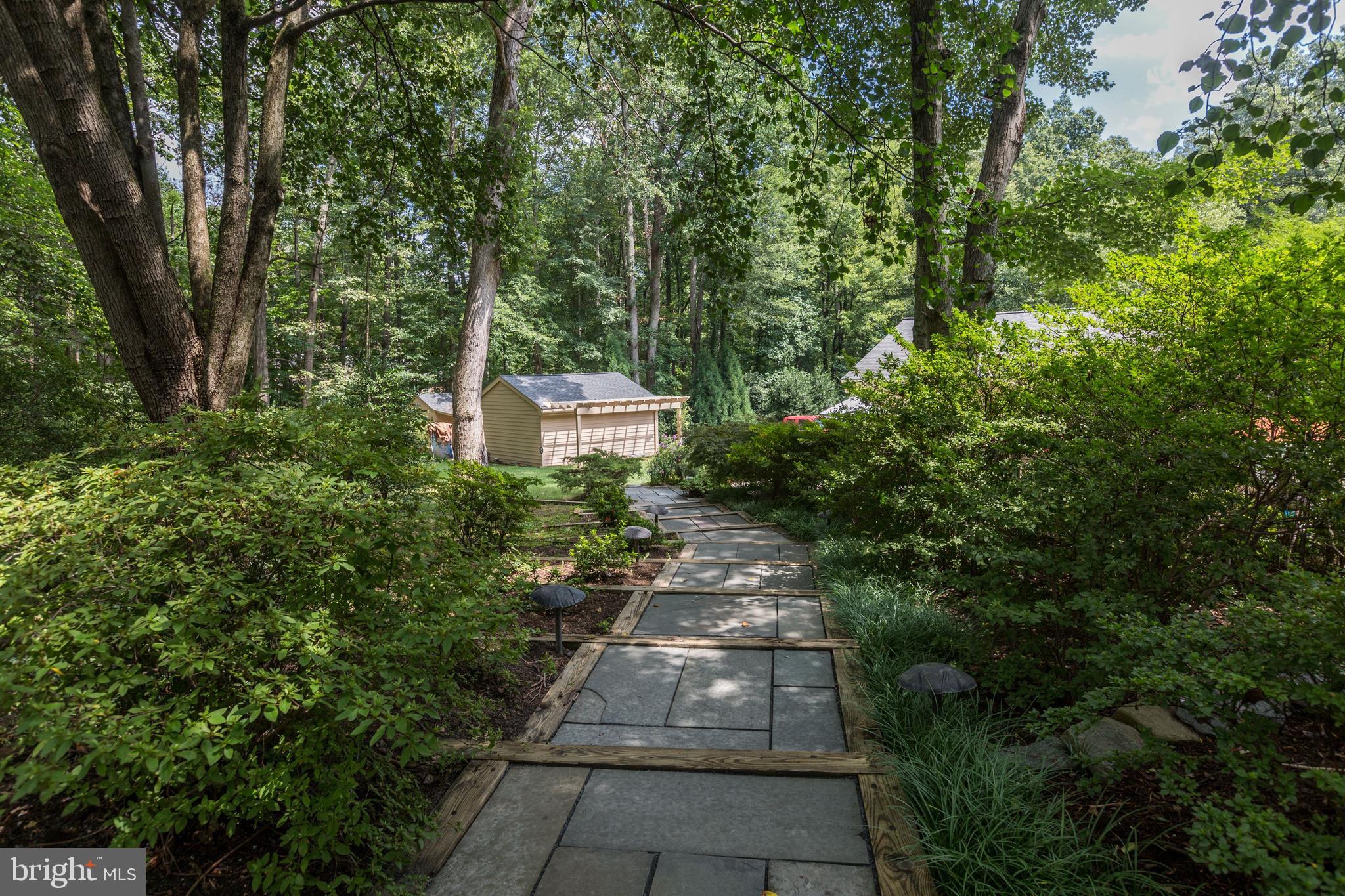 724 Clear Spring Road Great Falls, VA 22066 - Photo 51 of 57 a walk up to the tennis court