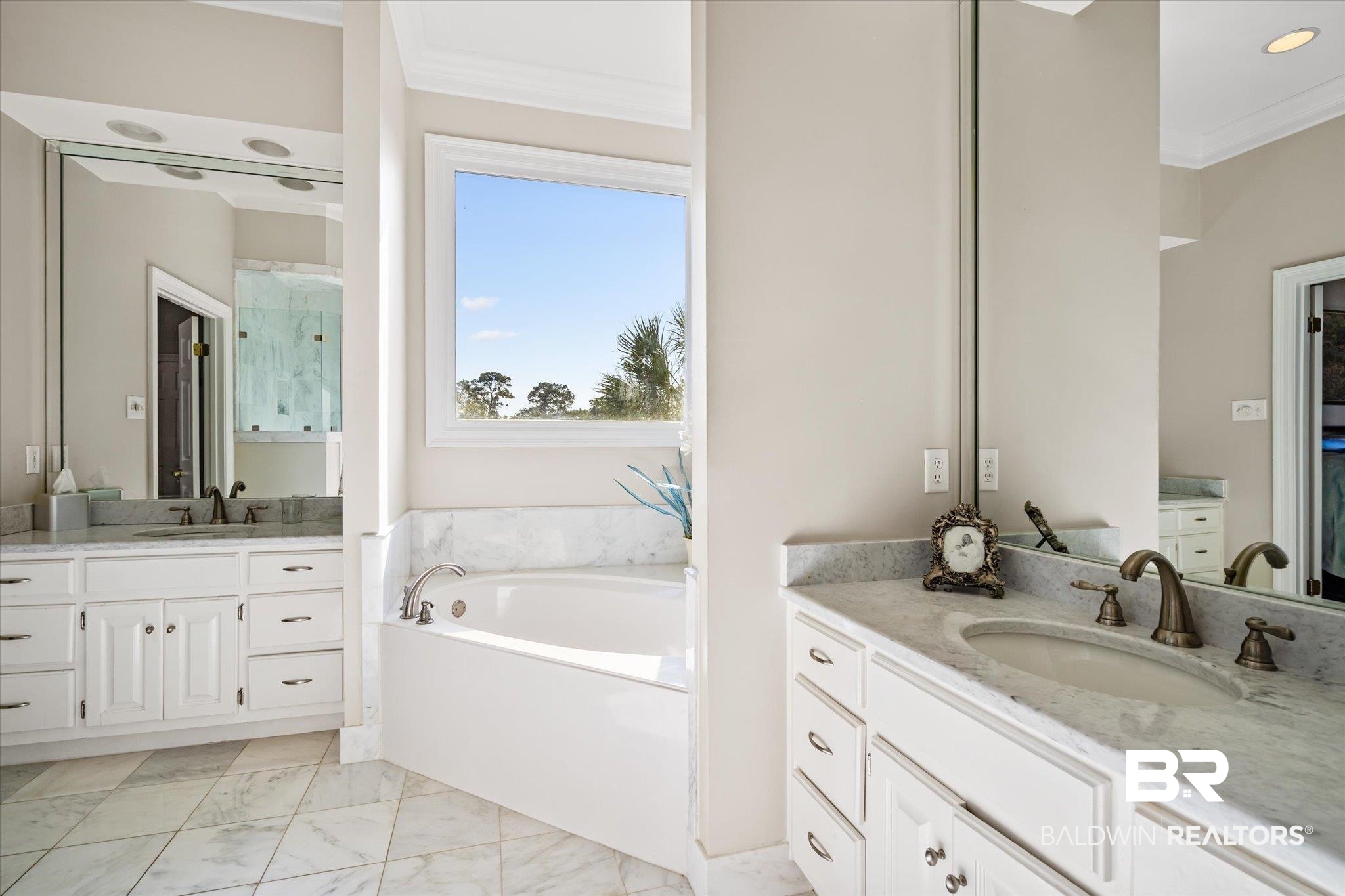 4930 River Trace Theodore, AL 36582 - Photo 23 of 57 Bathroom featuring vanity, crown molding, and separate shower and tub