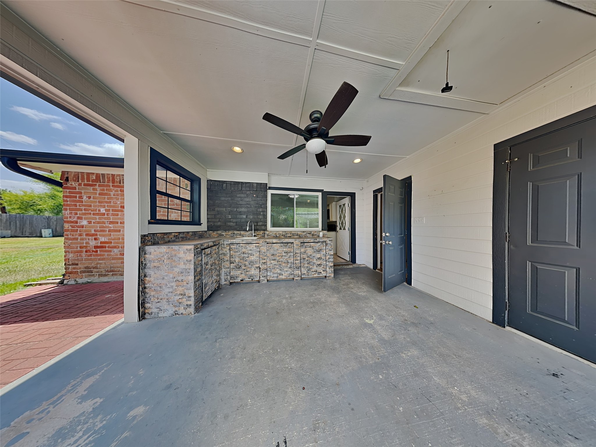 22902 Summer Green Lane Spring, TX 77373 - Photo 14 of 15 a view of a livingroom with a ceiling fan window and wooden floor