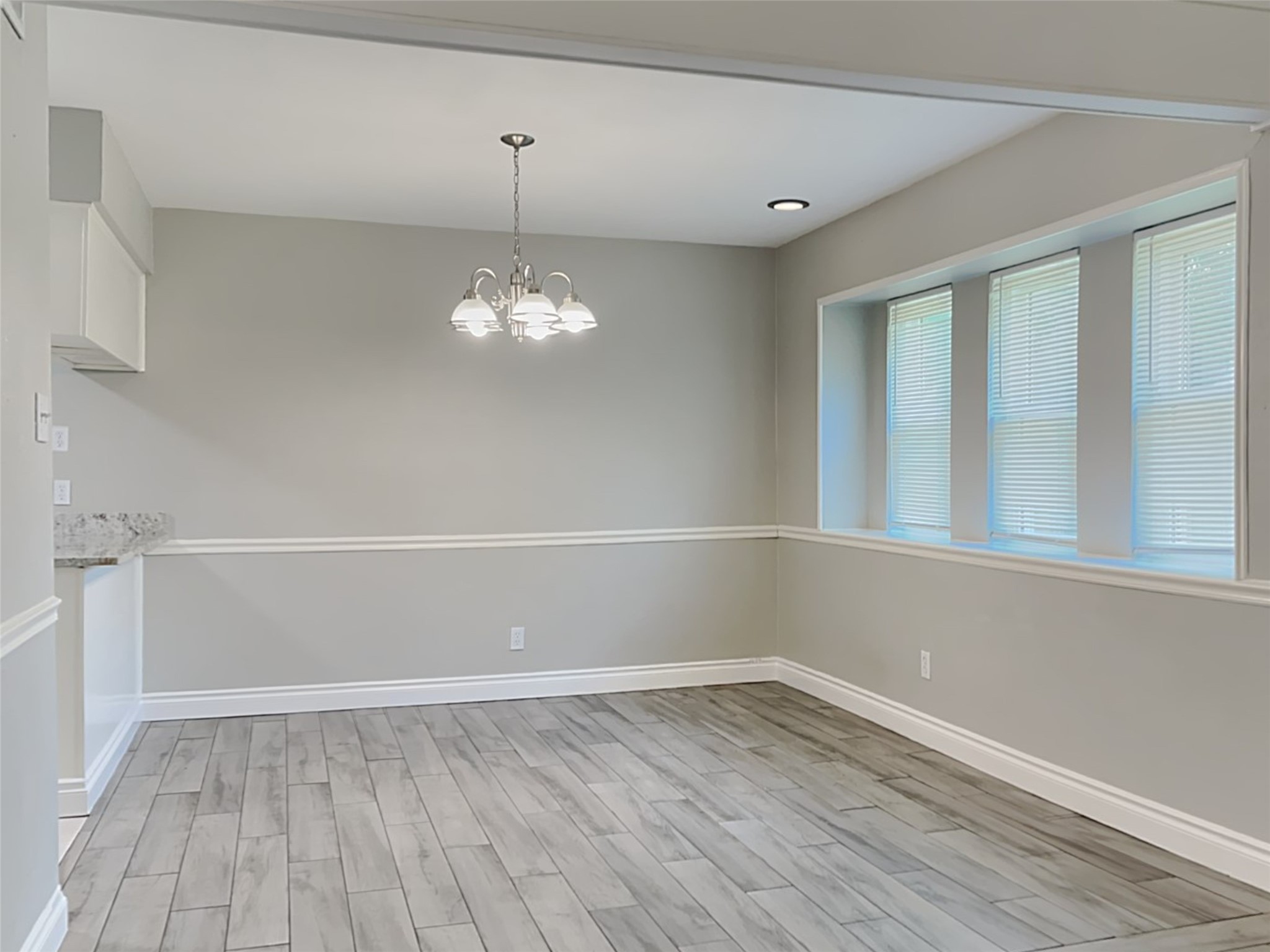 22902 Summer Green Lane Spring, TX 77373 - Photo 5 of 15 wooden floor in an empty room with a window