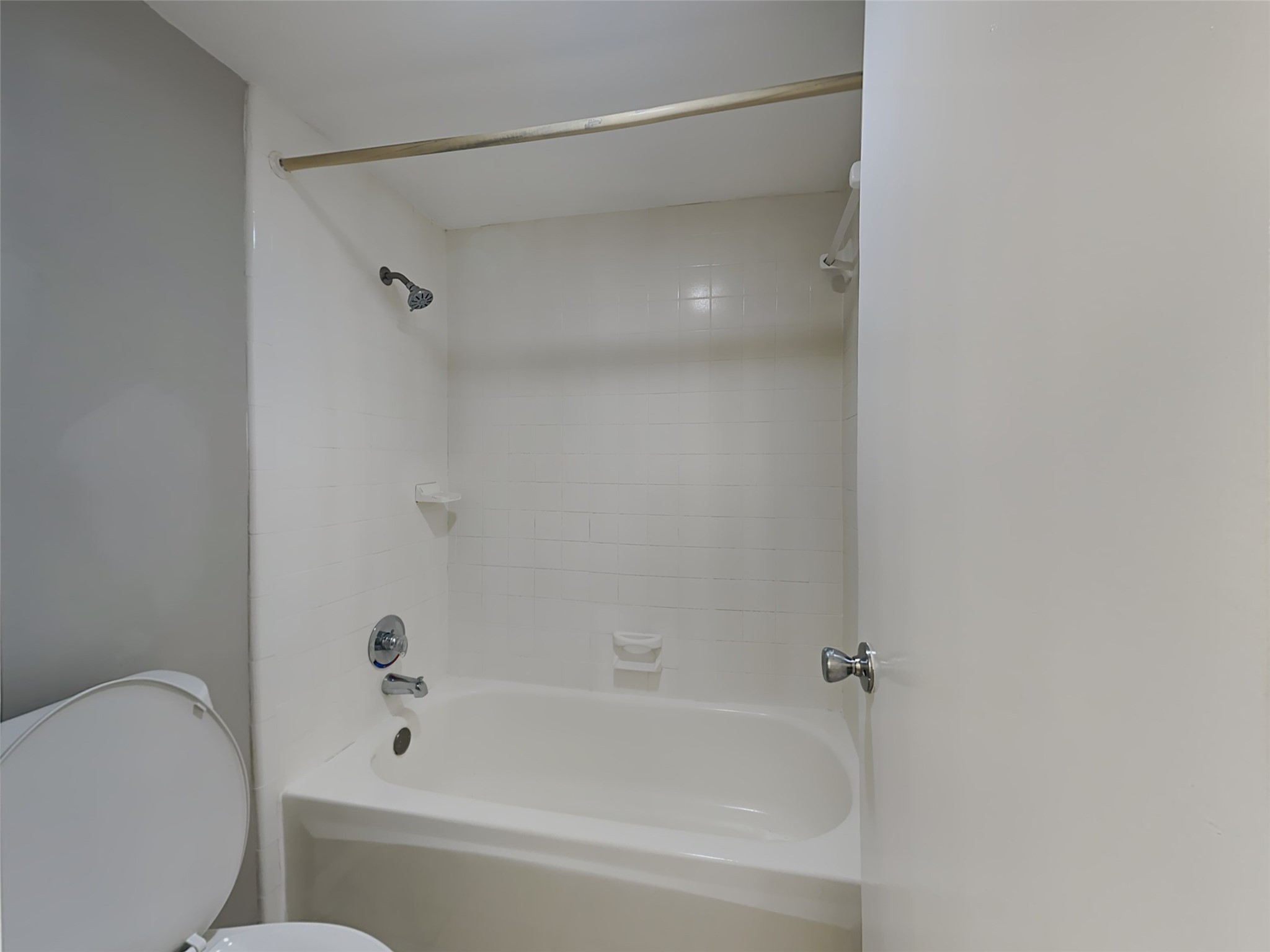 22902 Summer Green Lane Spring, TX 77373 - Photo 8 of 15 a bathroom with a bathtub and a shower