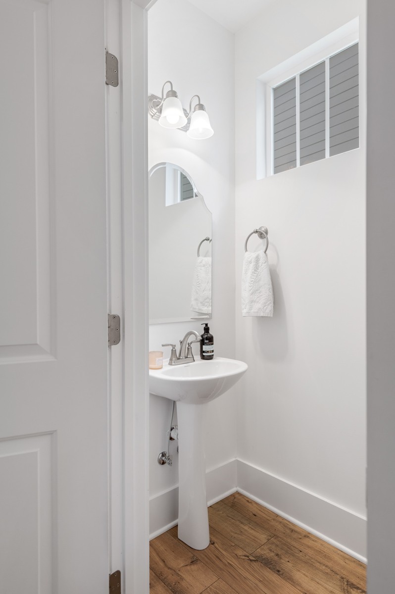 6043 Gracious Drive Franklin, TN 37064 - Photo 23 of 49 a bathroom with a sink and a mirror