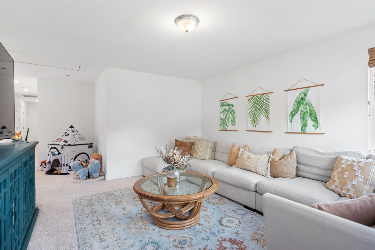 6043 Gracious Drive Franklin, TN 37064 - Photo 33 of 49 a living room with furniture and a wooden floor