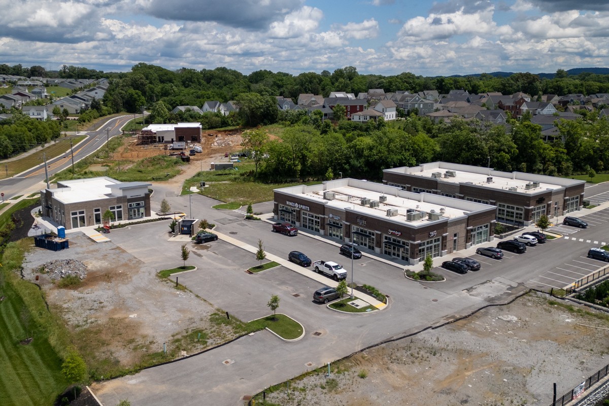 6043 Gracious Drive Franklin, TN 37064 - Photo 46 of 49 an aerial view of a house with garden space and street view