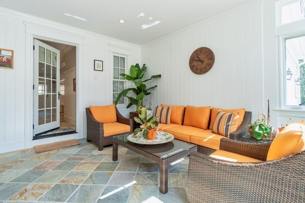291 Musterfield Road Concord, MA 01742 - Photo 13 of 32 a living room with furniture potted plant and window