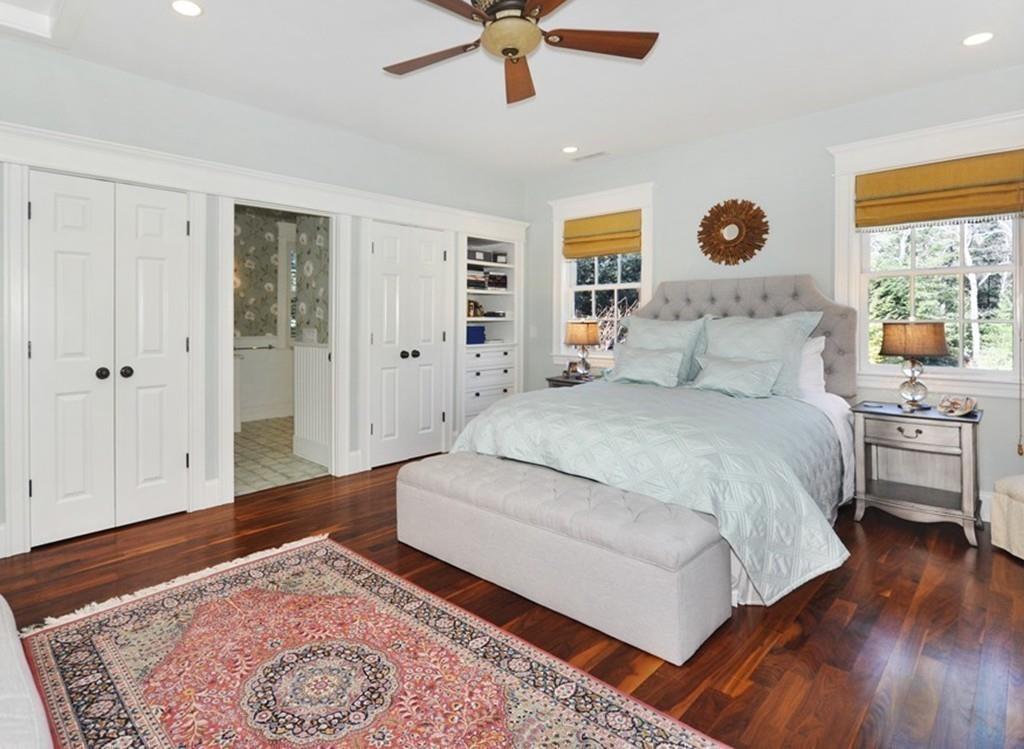 291 Musterfield Road Concord, MA 01742 - Photo 20 of 32 a bedroom with a bed and a window