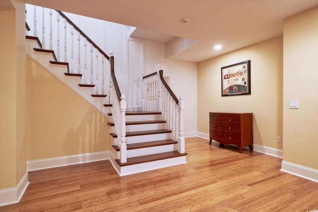 291 Musterfield Road Concord, MA 01742 - Photo 26 of 32 a view of entryway and hall with wooden floor
