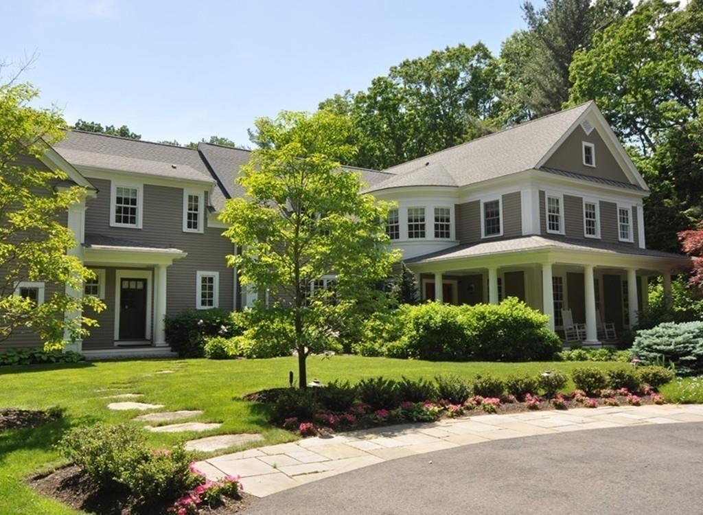 291 Musterfield Road Concord, MA 01742 - Photo 3 of 32 a front view of a house with a garden