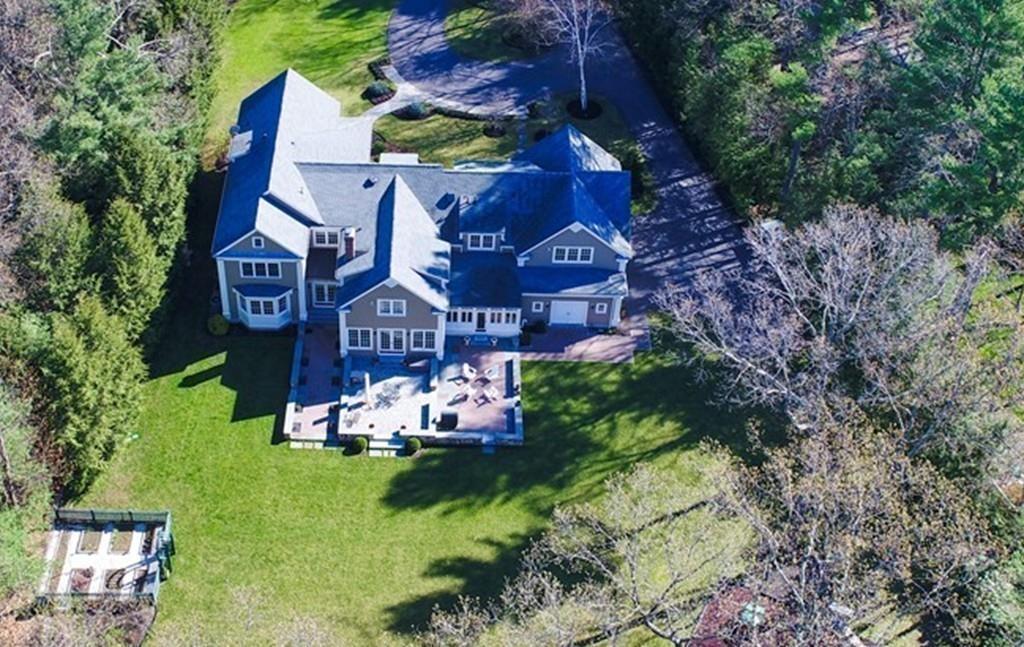 291 Musterfield Road Concord, MA 01742 - Photo 31 of 32 a view of a chairs and sign in a yard