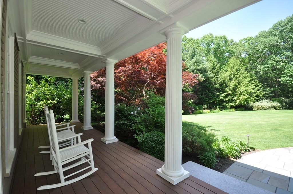 291 Musterfield Road Concord, MA 01742 - Photo 4 of 32 a view of a sitting area with chairs and wooden floor