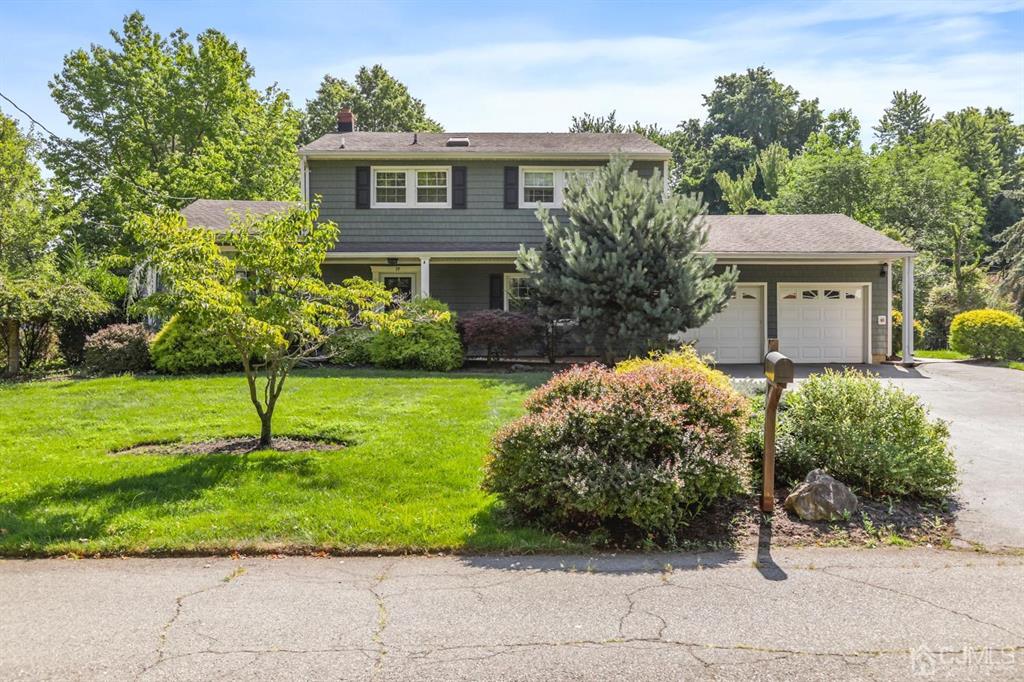 19 Mary Ellen Drive Edison, NJ 08820 - Photo 1 of 36 a front view of a house with a yard