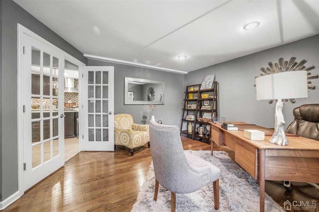 19 Mary Ellen Drive Edison, NJ 08820 - Photo 16 of 36 a living room with furniture and wooden floor