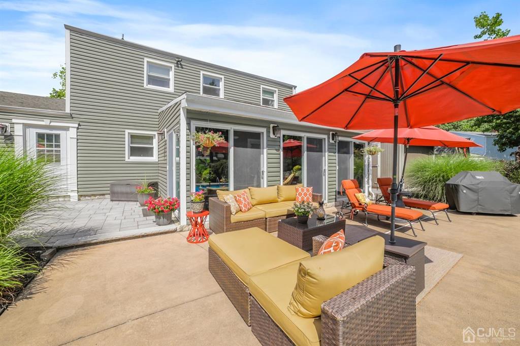 19 Mary Ellen Drive Edison, NJ 08820 - Photo 21 of 36 a view of a house with backyard and sitting area