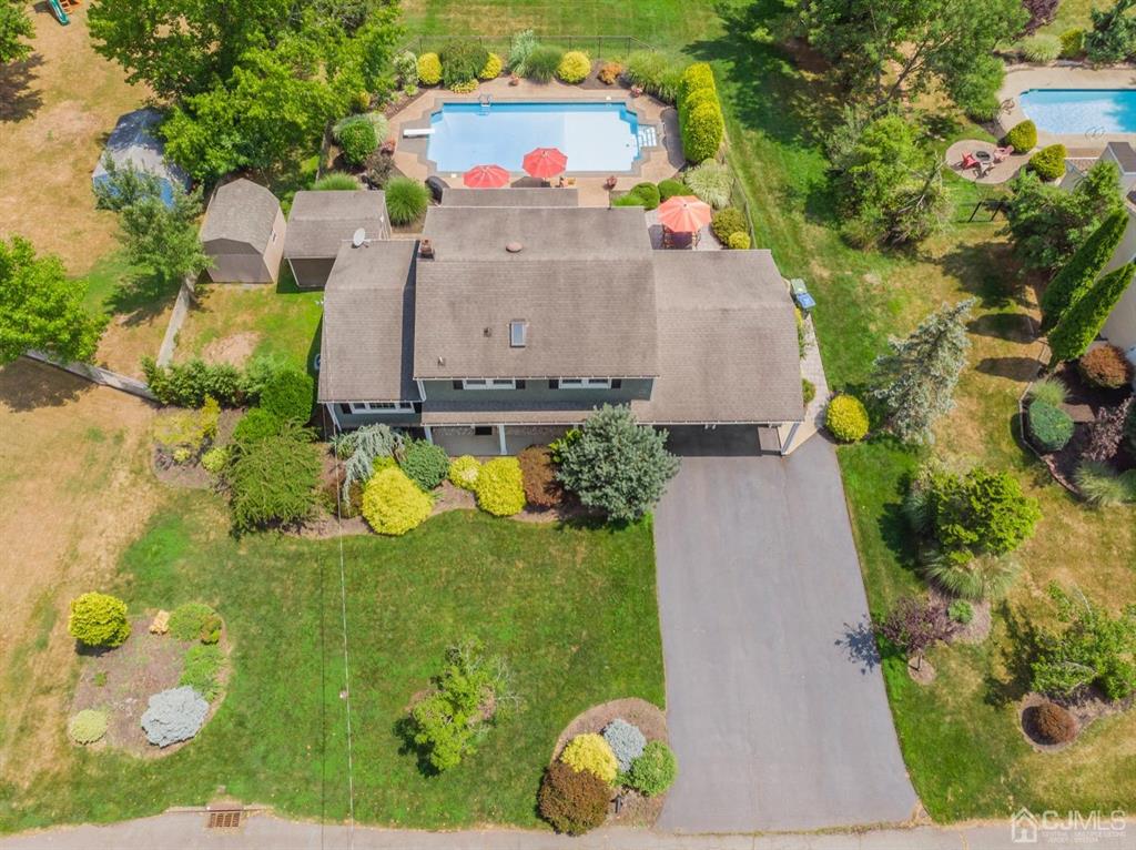 19 Mary Ellen Drive Edison, NJ 08820 - Photo 36 of 36 an aerial view of a house with a yard and pool