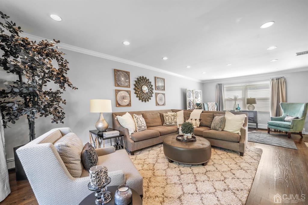 19 Mary Ellen Drive Edison, NJ 08820 - Photo 6 of 36 a living room with furniture and wooden floor