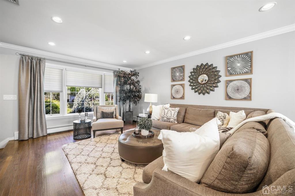19 Mary Ellen Drive Edison, NJ 08820 - Photo 7 of 36 a living room with furniture and a large window