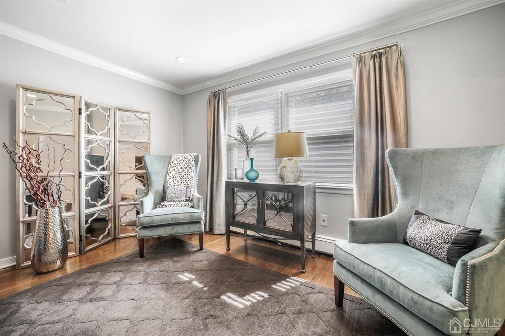 19 Mary Ellen Drive Edison, NJ 08820 - Photo 8 of 36 a living room with furniture and a fireplace