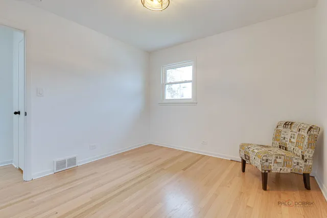 a room with a table and a chair