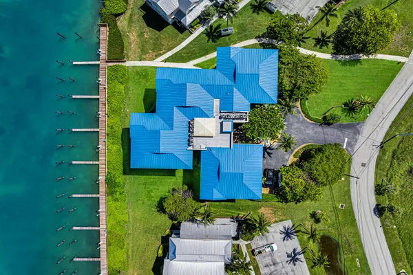 an aerial view of a house with a garden