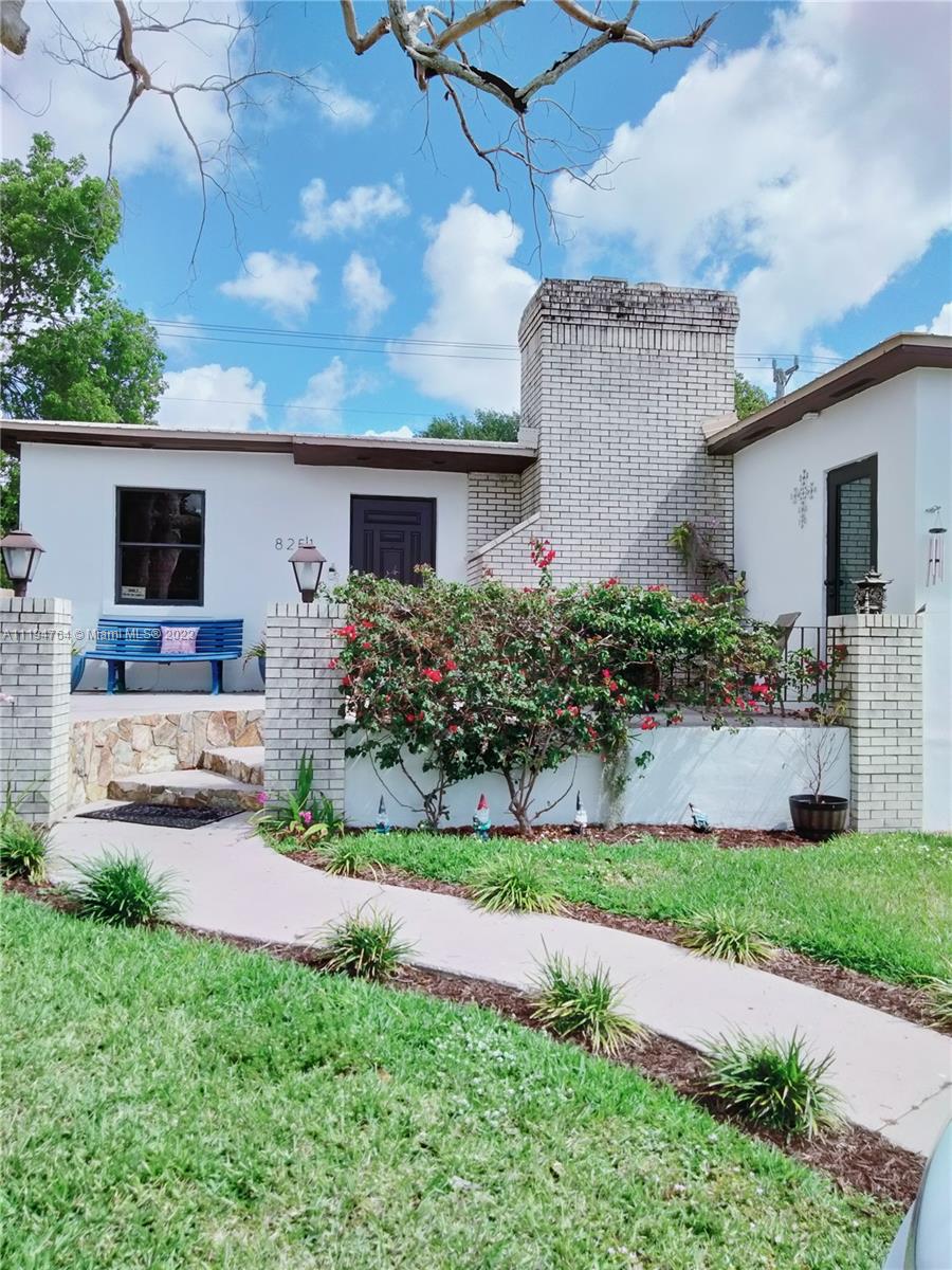 8251 Southwest 34th Terrace Miami, FL 33155 - Photo 24 of 24 a front view of a house with garden