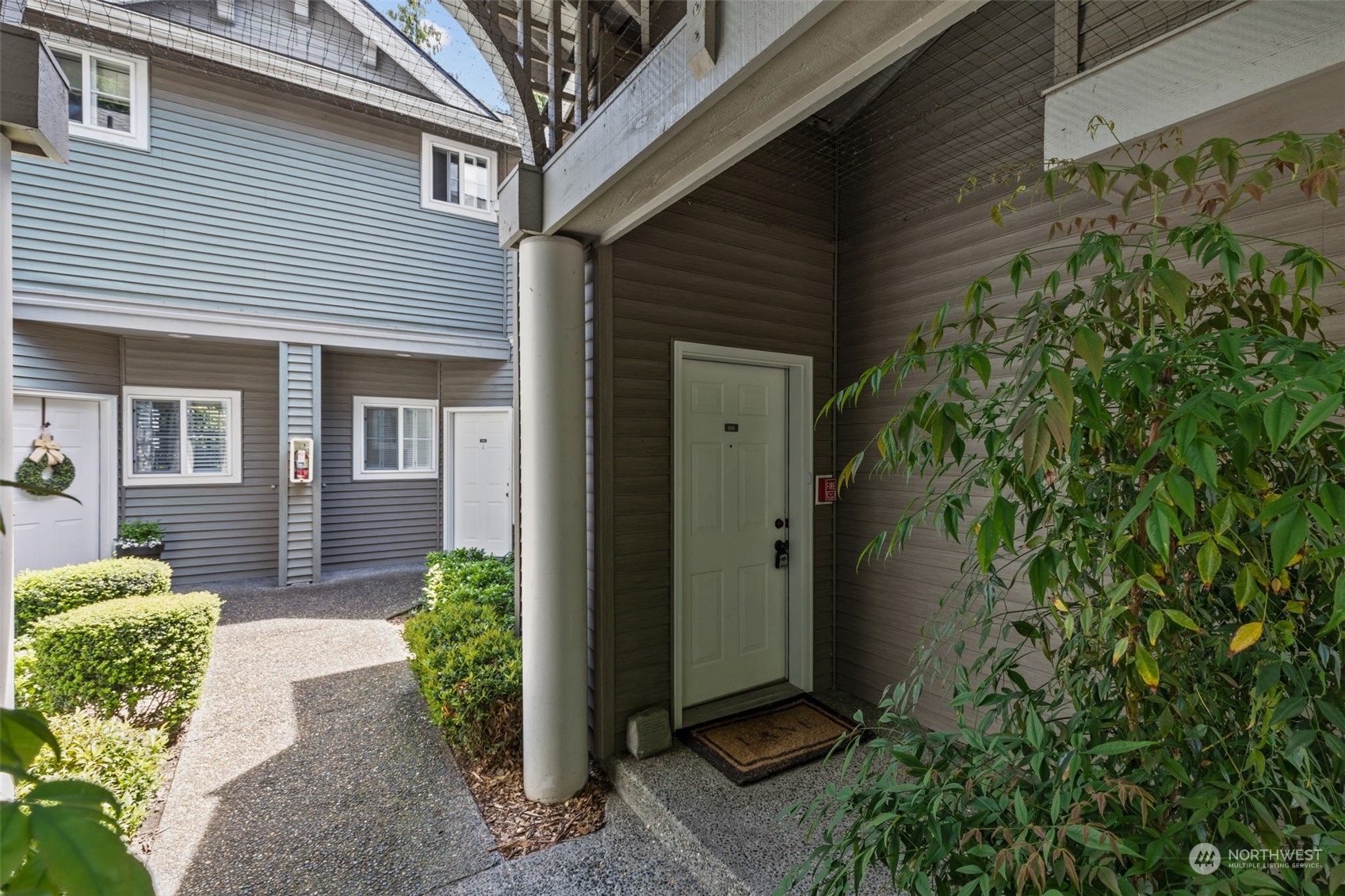 22727 4th Avenue West, Unit 106 Bothell, WA 98021 - Photo 2 of 35 a view of a pathway with a house