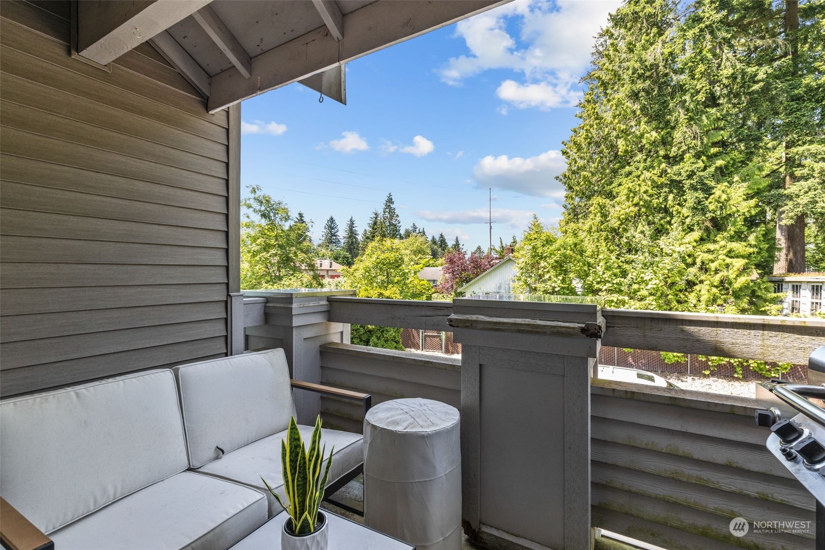 22727 4th Avenue West, Unit 106 Bothell, WA 98021 - Photo 28 of 35 a view of a chairs and table in a balcony