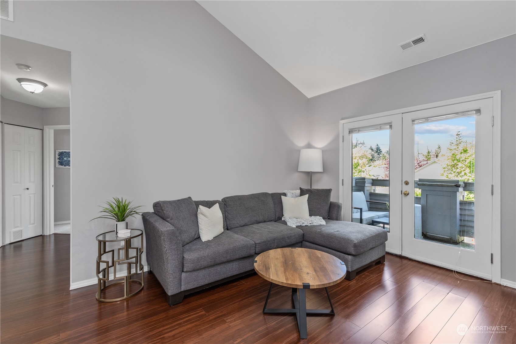 22727 4th Avenue West, Unit 106 Bothell, WA 98021 - Photo 5 of 35 a living room with furniture and a wooden floor