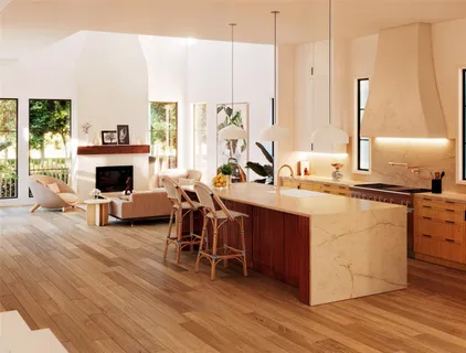 a living room with furniture a fireplace and a table