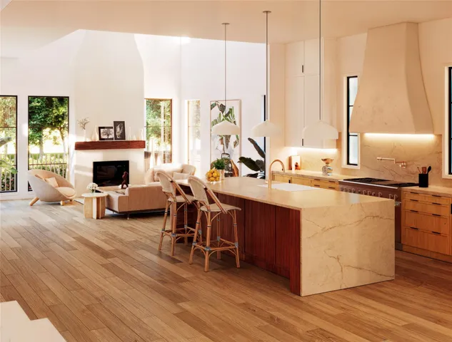 a living room with furniture a fireplace and a table