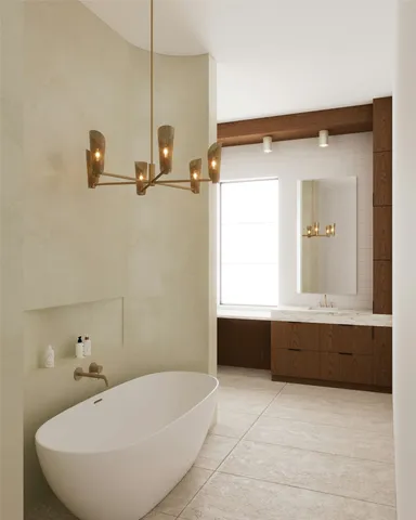 a bathroom with a tub and sink