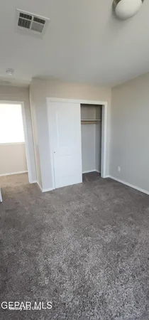 a bathroom with a sink a toilet and a vanity