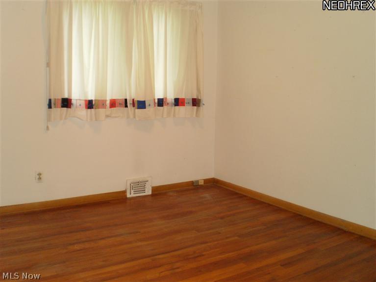 1167 Hansford Road Lyndhurst, OH 44124 - Photo 5 of 12 Three Bedrooms with Hardwood Floors.