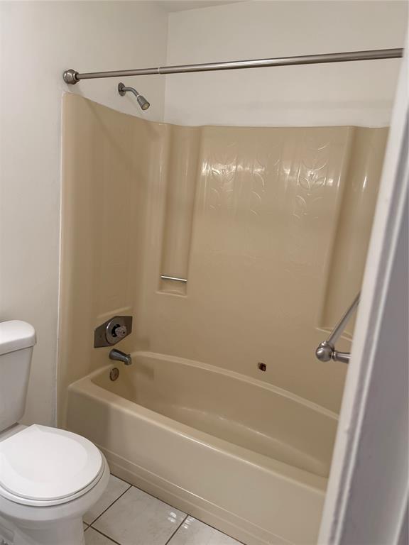 6040 Shaker Wood Circle, Unit 205 Tamarac, FL 33319 - Photo 14 of 14 a bathroom with a shower and a toilet