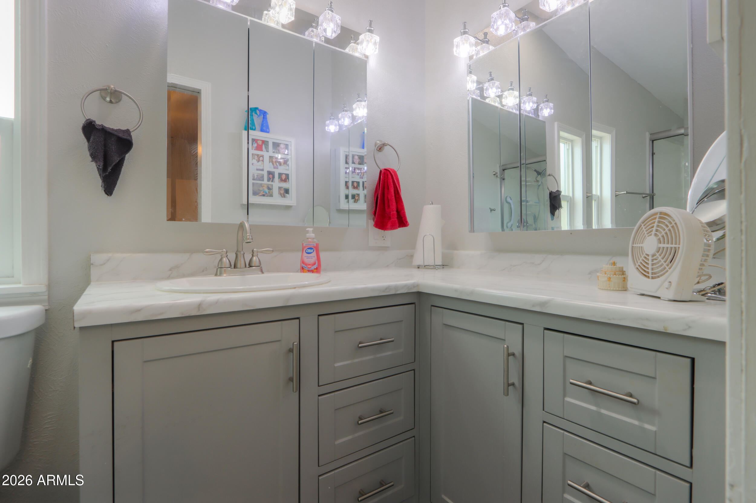 2100 North Trekell Road, Unit 290 Casa Grande, AZ 85122 - Photo 25 of 35 a bathroom with a sink vanity and mirror