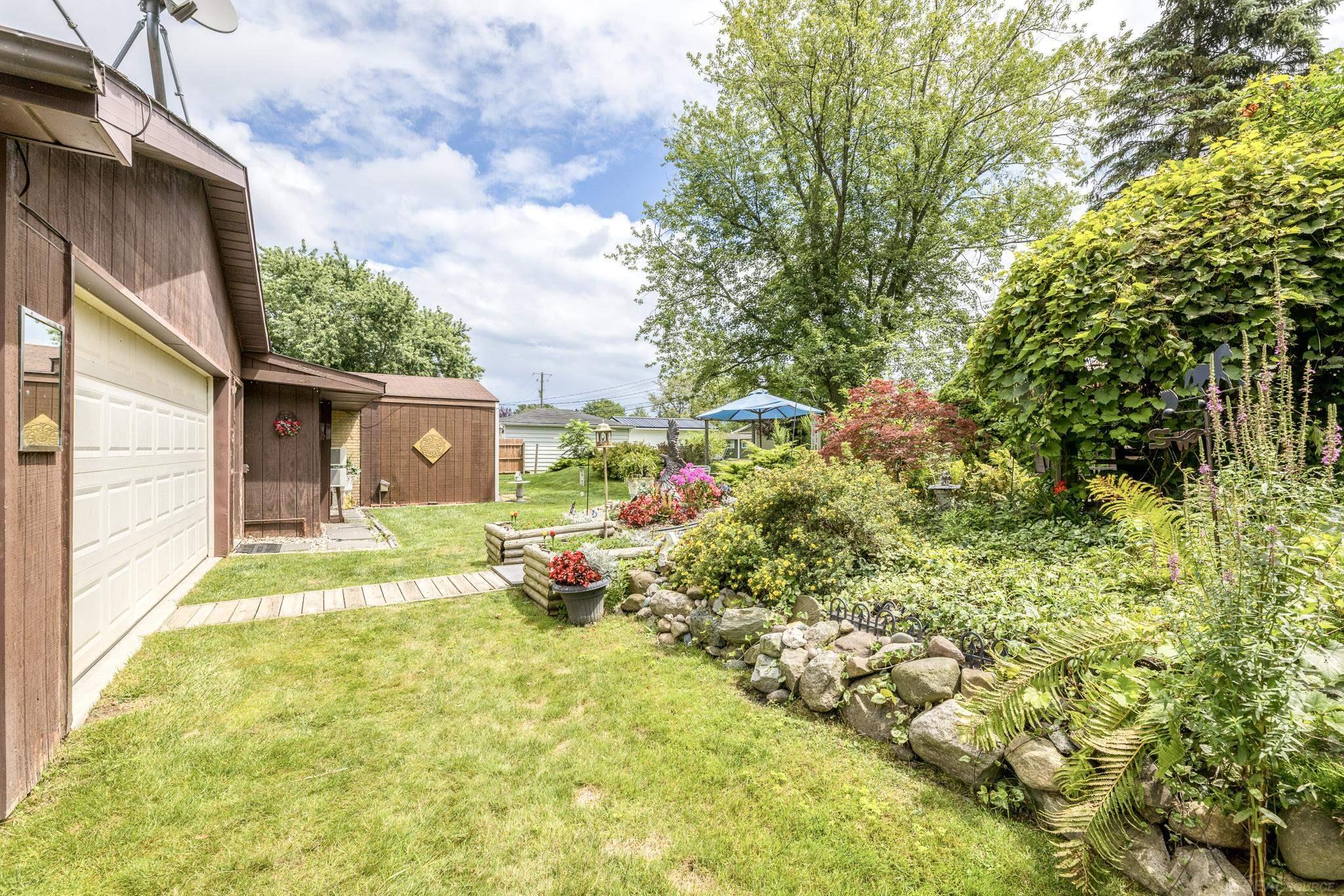 7474 Cardinal Road Lexington, MI 48450 - Photo 36 of 56 Magnificent Backyard!