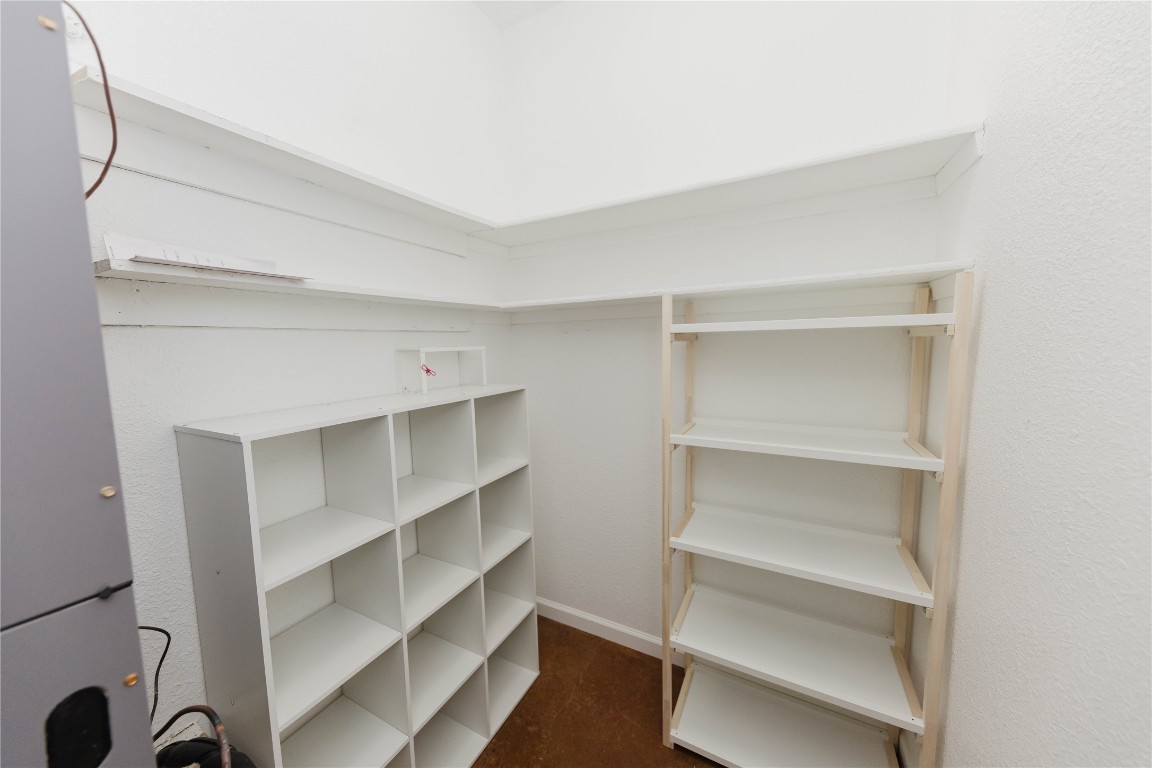 107 Silver Fox Waco, TX 76705 - Photo 22 of 33 a view of walk in closet with empty racks