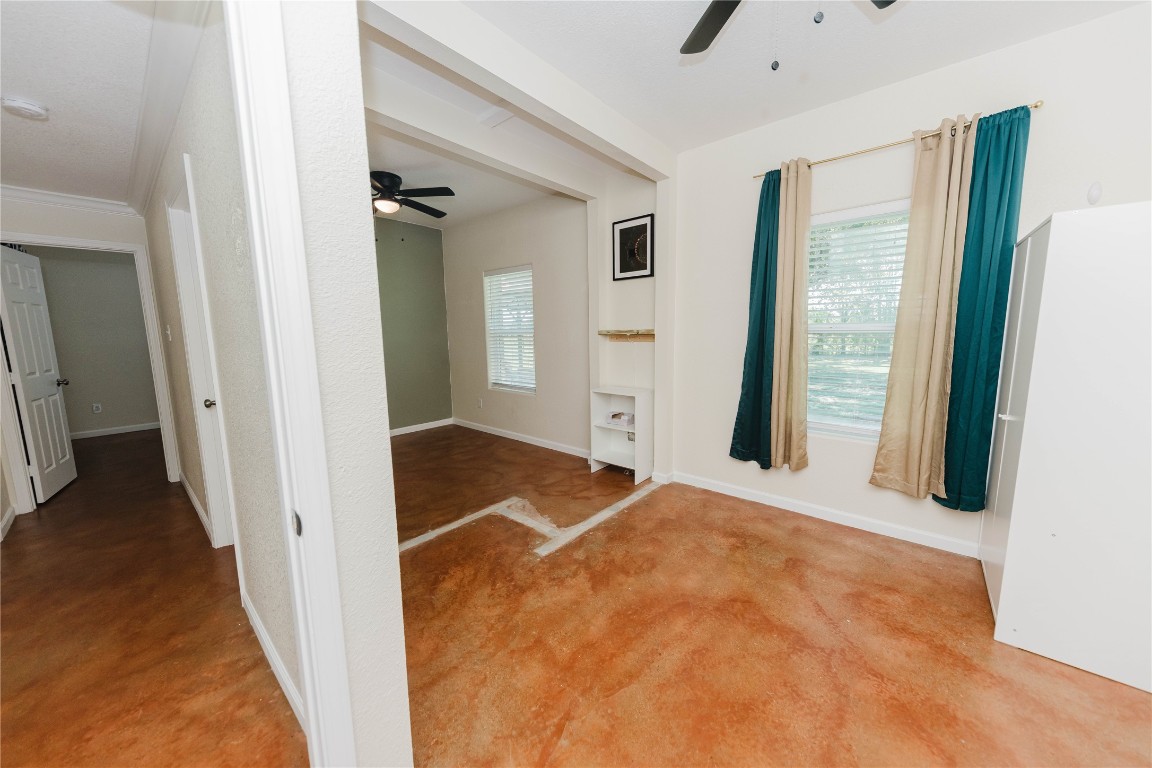 107 Silver Fox Waco, TX 76705 - Photo 26 of 33 a view of empty room with wooden floor and fan