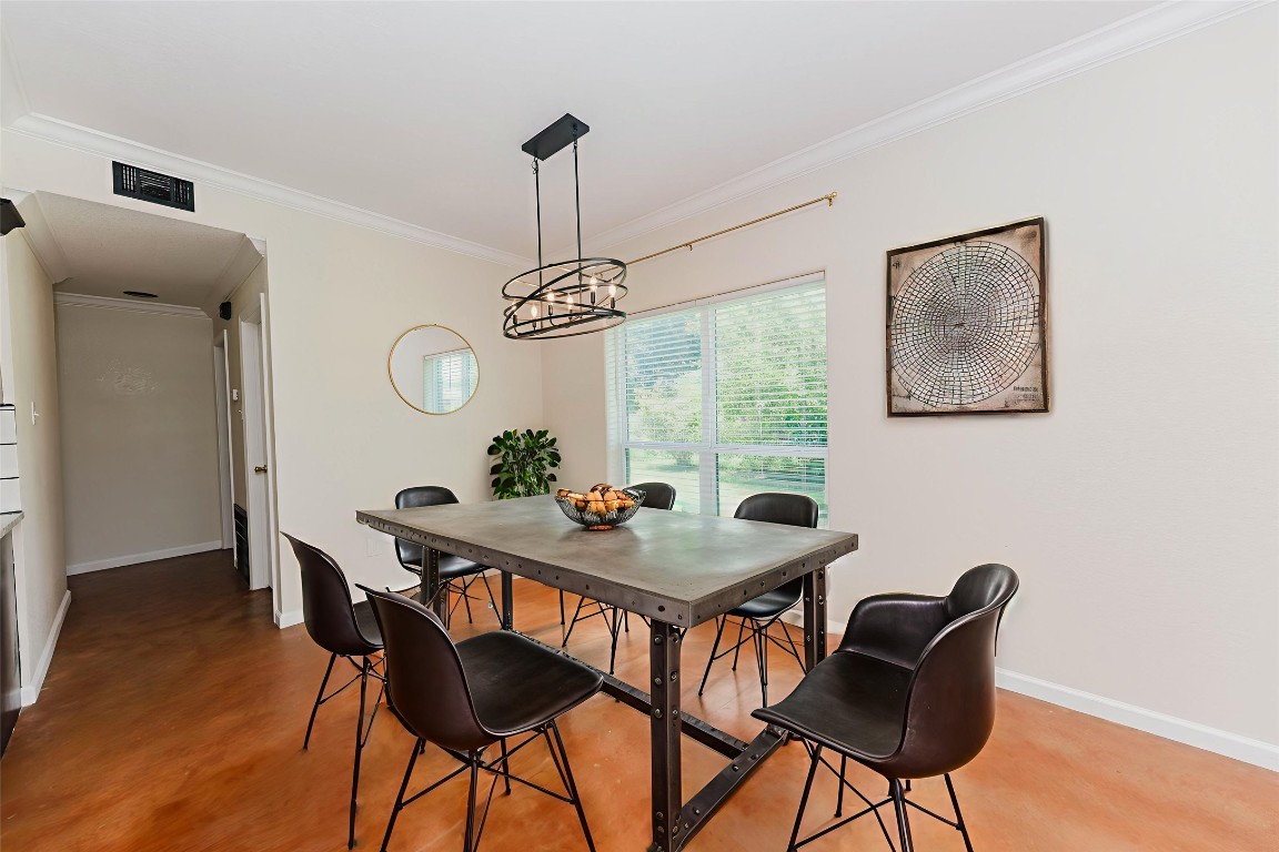 107 Silver Fox Waco, TX 76705 - Photo 10 of 33 a view of a dining room with furniture window and wooden floor