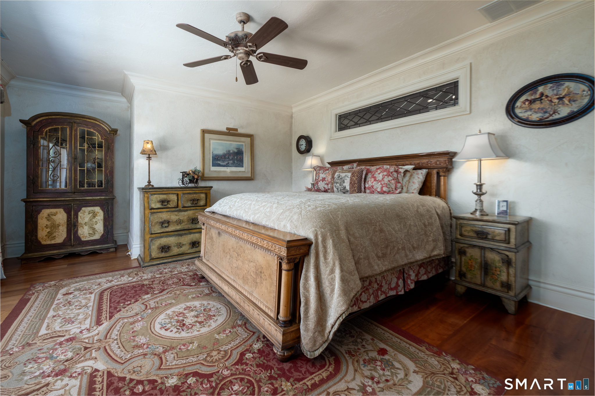 7 Equestrian Ridge Newtown, CT 06470 - Photo 31 of 40 a bedroom with a bed and a table in it