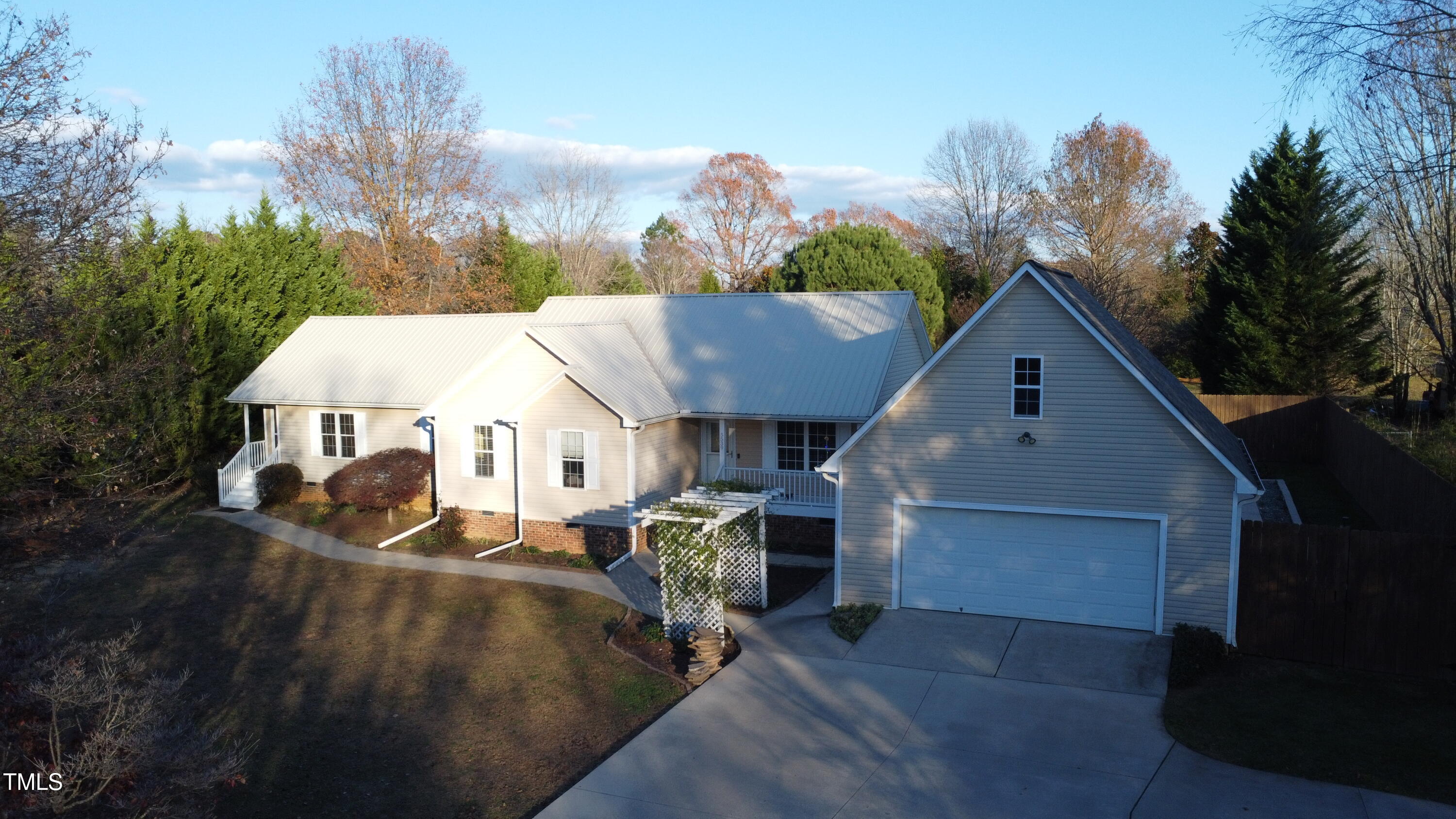 5539 Fieldview Road Mebane, NC 27302 - Photo 5 of 49 front slightly elevated view of garage a
