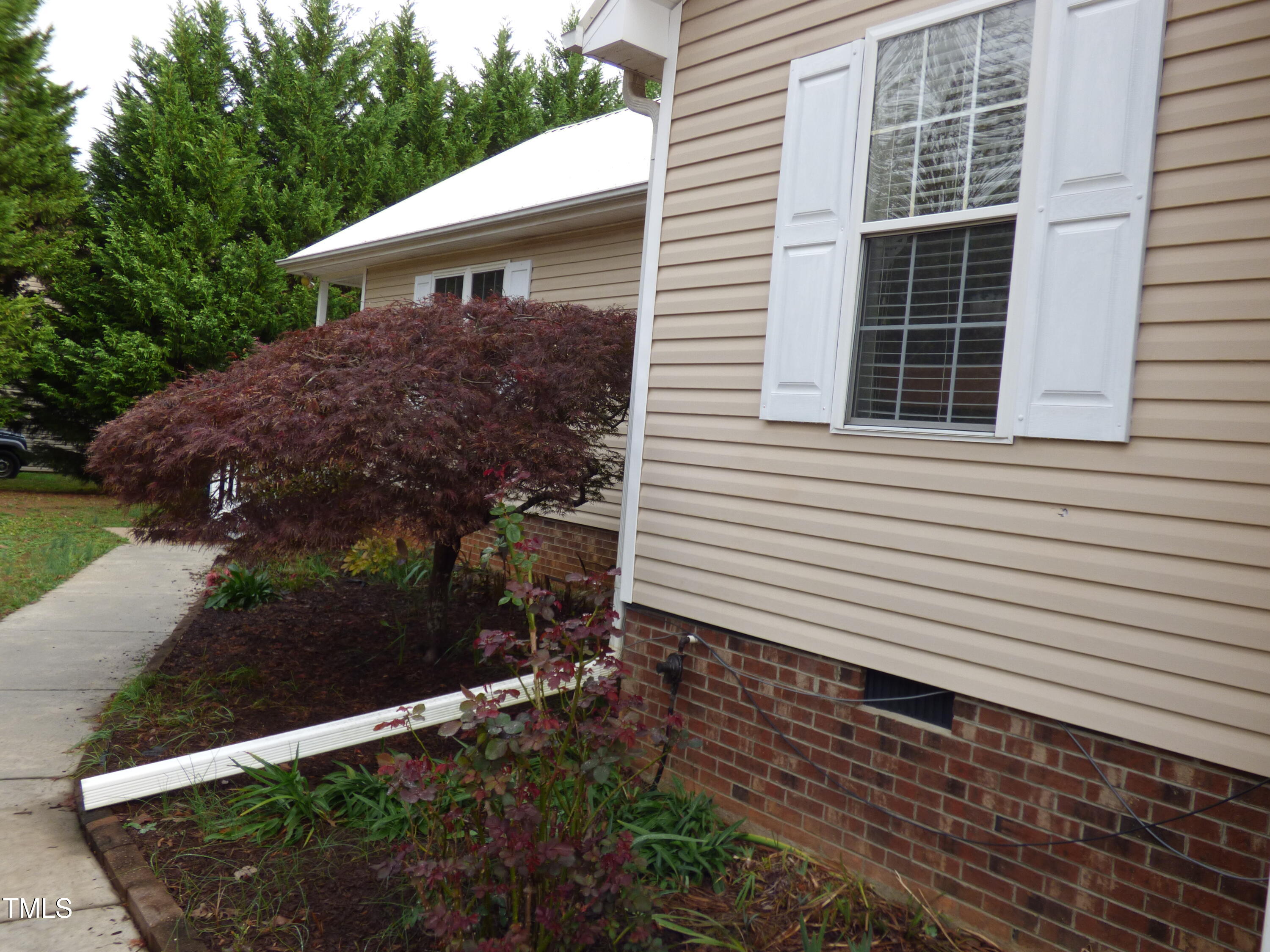 5539 Fieldview Road Mebane, NC 27302 - Photo 8 of 49 front with bushes