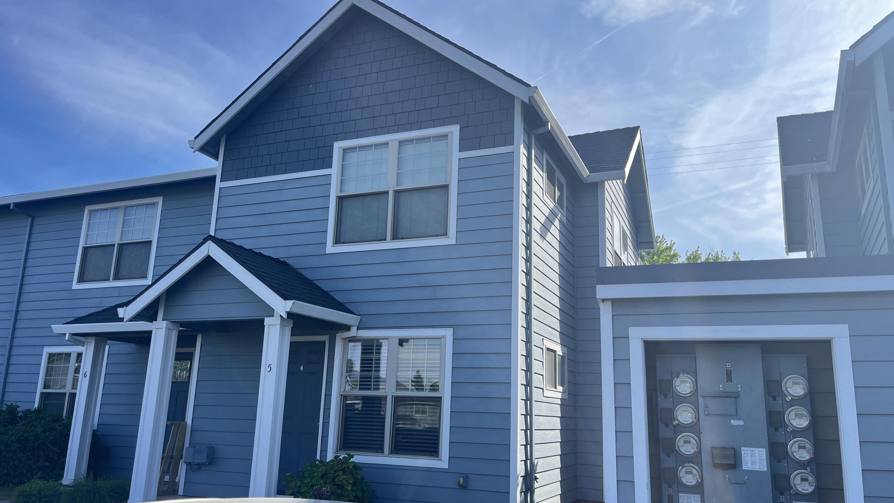 450 Midway Road, Unit 5 Medford, OR 97501 - Photo 1 of 46 a house view with a wooden door and door