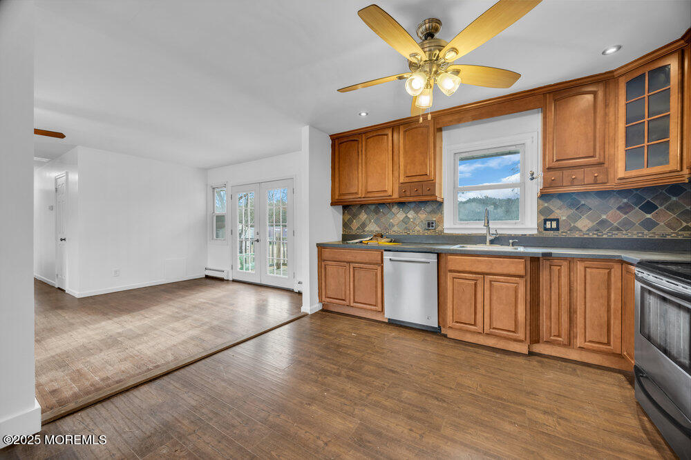 Undisclosed Address New Egypt, NJ 08533 - Photo 12 of 28 a kitchen with stainless steel appliances granite countertop a stove a sink and a microwave