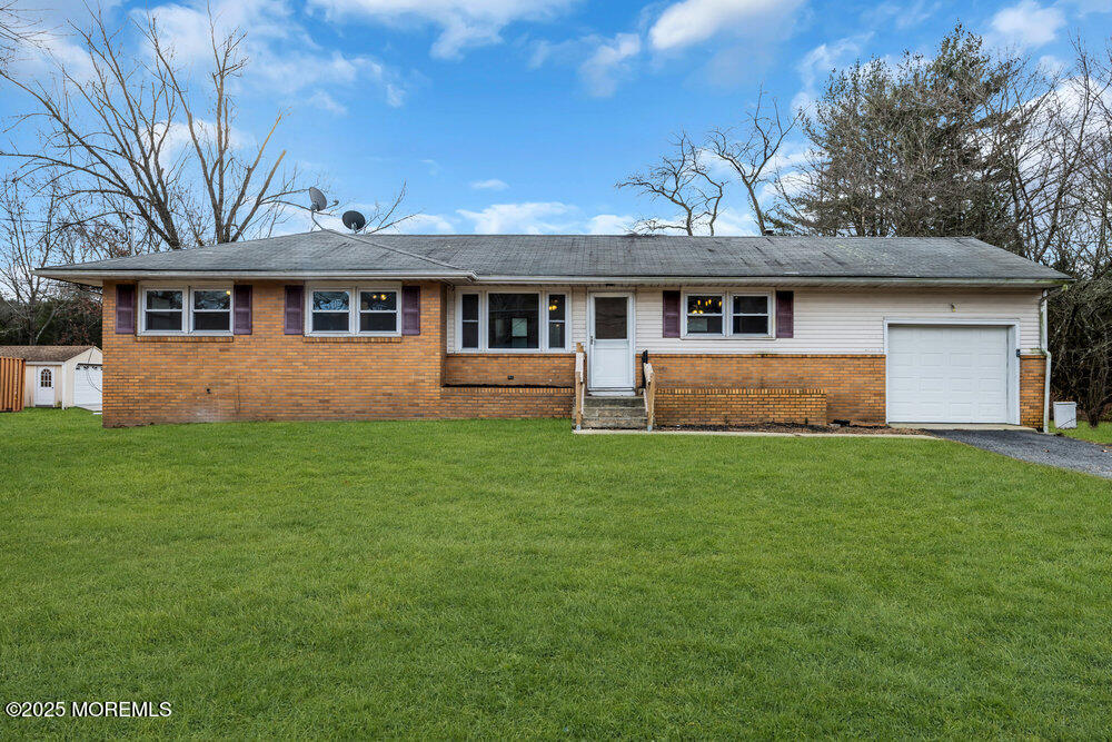 Undisclosed Address New Egypt, NJ 08533 - Photo 3 of 28 a front view of house with yard and green space