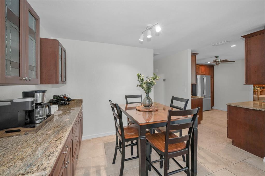 2949 Glenpark Road Palm Harbor, FL 34683 - Photo 21 of 60 a view of a dining room with furniture