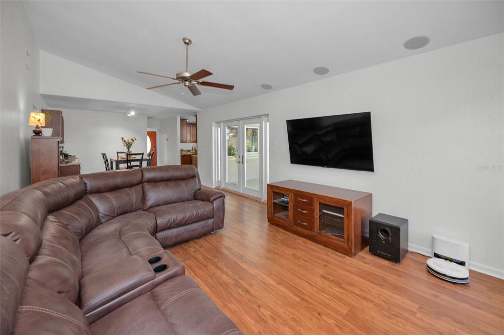 2949 Glenpark Road Palm Harbor, FL 34683 - Photo 30 of 60 a living room with furniture and a flat screen tv