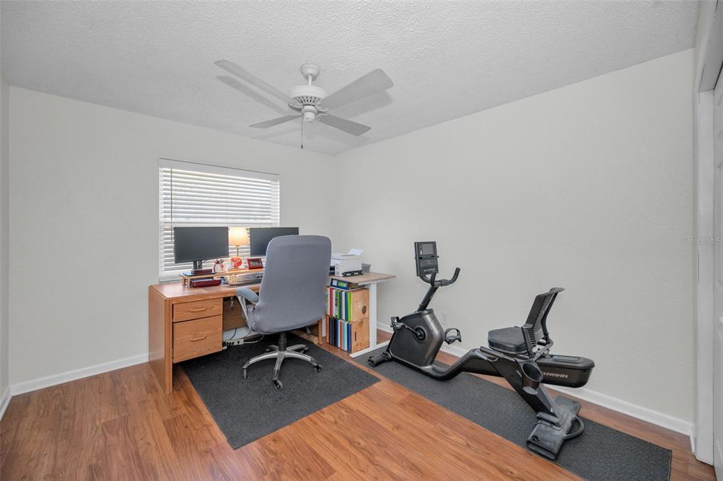 2949 Glenpark Road Palm Harbor, FL 34683 - Photo 40 of 60 a view of a workspace with furniture and a window