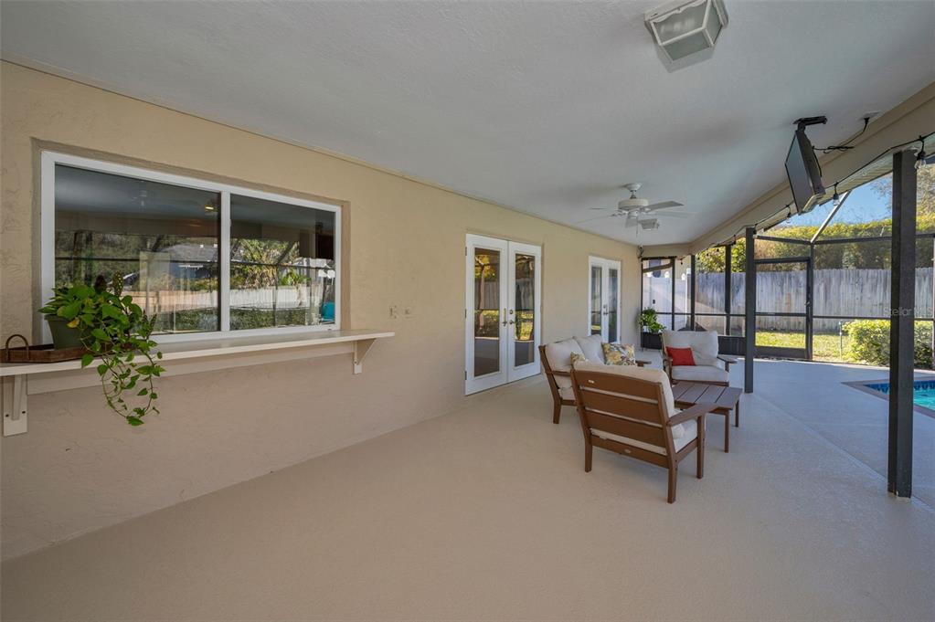 2949 Glenpark Road Palm Harbor, FL 34683 - Photo 43 of 60 a view of a livingroom with furniture window and outside view